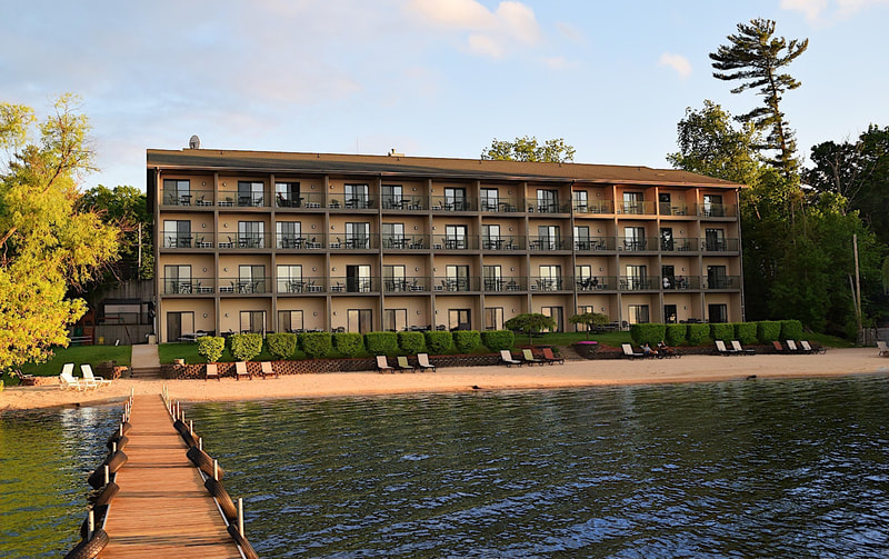 View of hotel exterior from lake dock